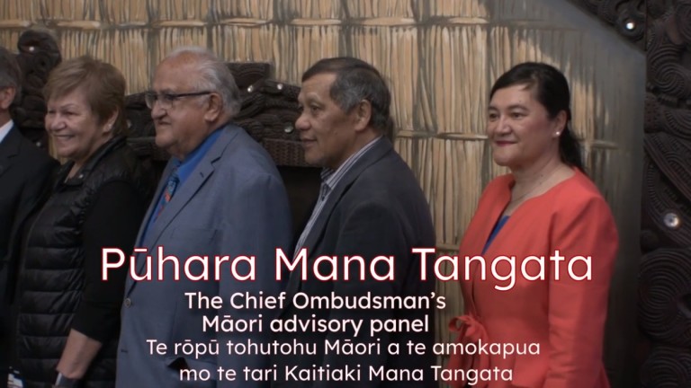 A group shot of Pūhara Mana Tangata with the words Pūhara Mana Tangata, The Chief Ombudsman’s Māori advisory panel in English and Pūhara Mana Tangata, Te rōpū tohutohu Māori a te amokapua mo te tari Kaitiaki Mana Tangata in te reo Māori